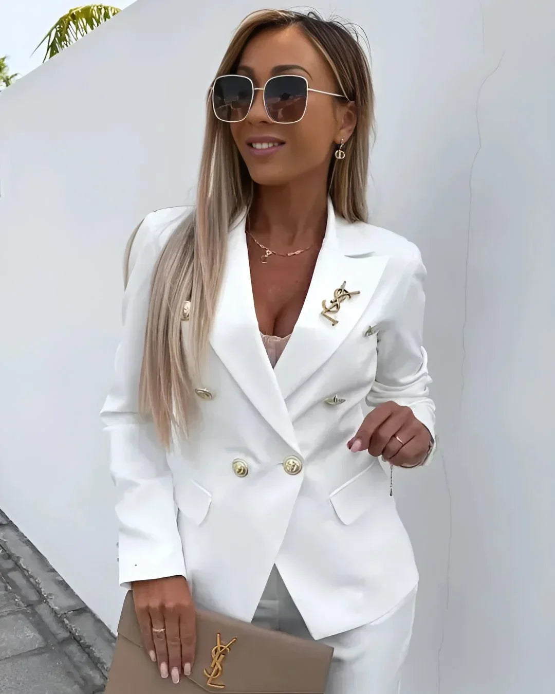 Premium women's double-breasted trouser suit set, designed for elegant and comfortable business professional style.