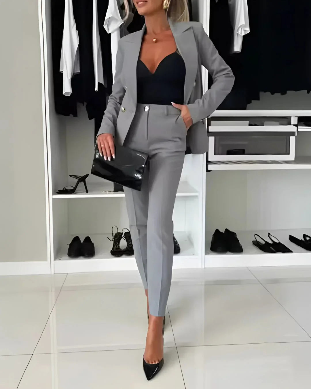Sophisticated double-breasted women's blazer suit, a two-piece set for polished business attire.