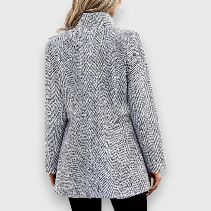 Versatile women's gray blazer, ideal for smart casual or professional business looks. Chic & comfortable.