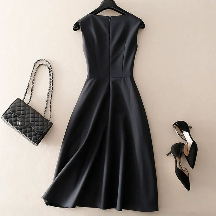 Chic women's tailored sleeveless cocktail dress, offering a sophisticated look for formal events or work.