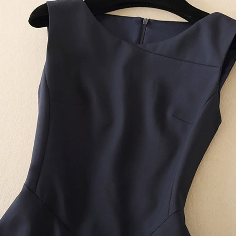 Professionally tailored sleeveless dress for women, an elegant choice for workwear & sophisticated occasions.