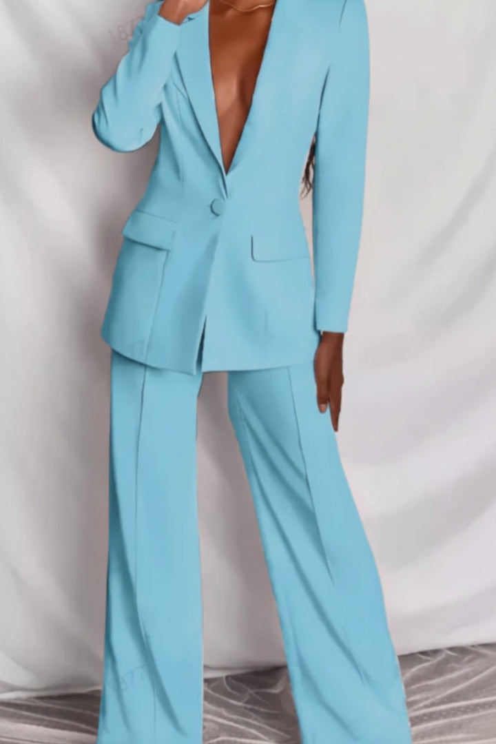 Women's tailored suit set with a structured blazer and perfectly fitted slim trousers for business.