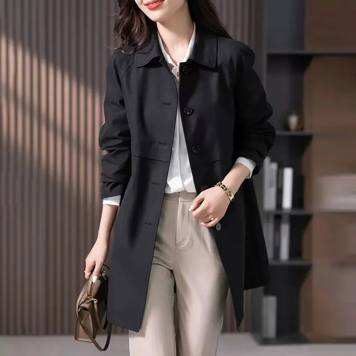 Chic women's tailored trench coat, offering elegance for office & comfort for casual outings. A versatile spring/fall jacket.