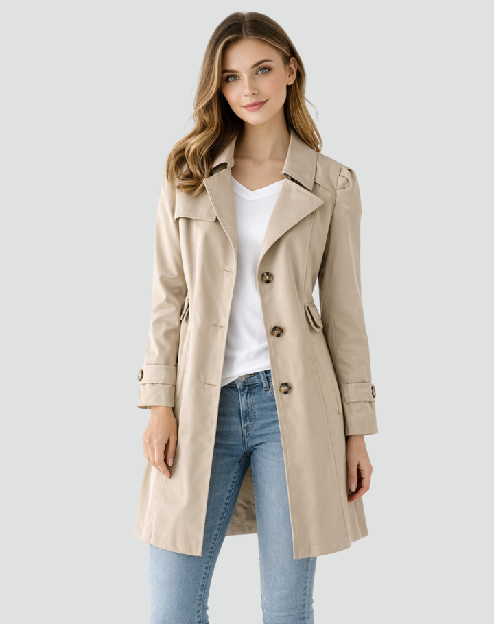 Versatile women's trench coat with tailored fit & lapel collar. Ideal for classic spring/fall outerwear fashion.