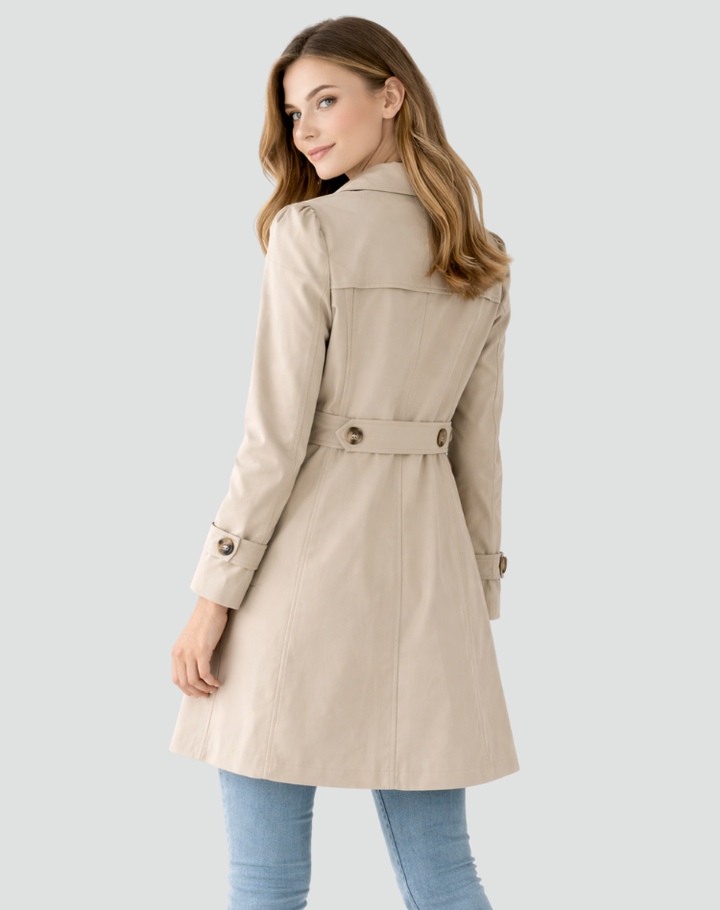 Women's classic tailored trench coat, button-up design. Elegant outerwear for versatile spring & fall fashion.
