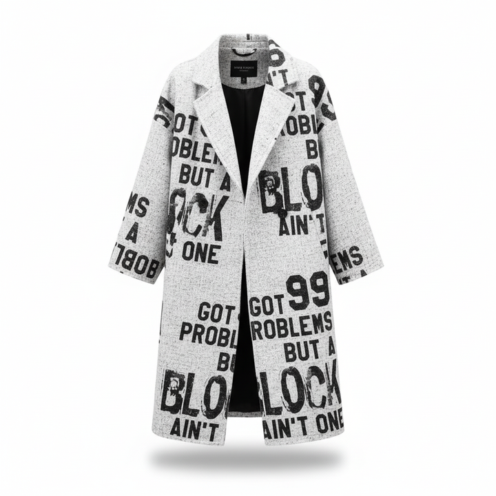 Stylish women's tailored wool winter coat draped, emphasizing its luxurious feel and design.