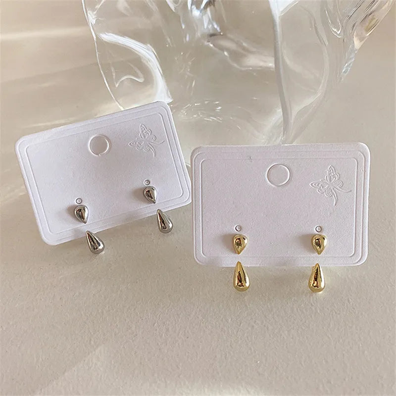 Fashionable women's teardrop stud earrings, a chic and elegant accessory for a minimalist and classic look.