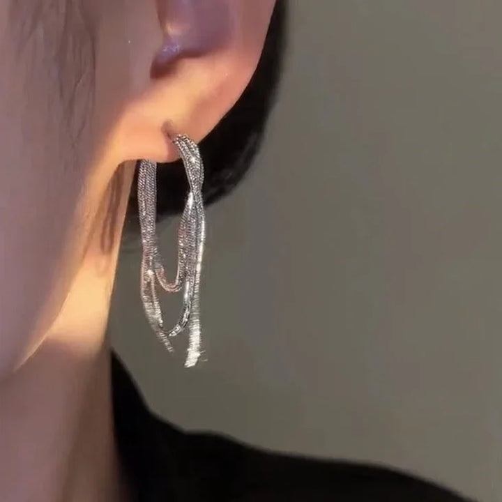 Stylish layered chain drop earrings for women, featuring a delicate three-tier design. Ideal women's jewelry gift.