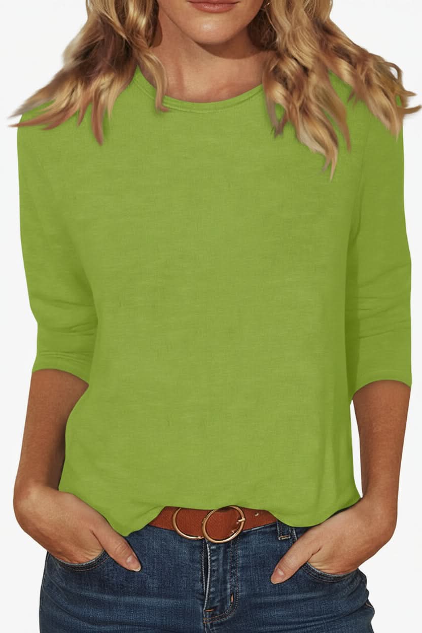 Sophisticated women's three-quarter sleeve blouse, a stylish top for effortless elegance and modern flair.