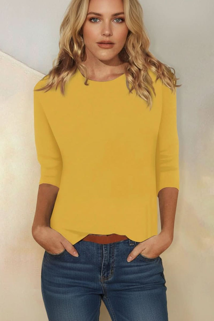 Modern women's elegant blouse featuring three-quarter sleeves, ideal for versatile casual to evening looks.