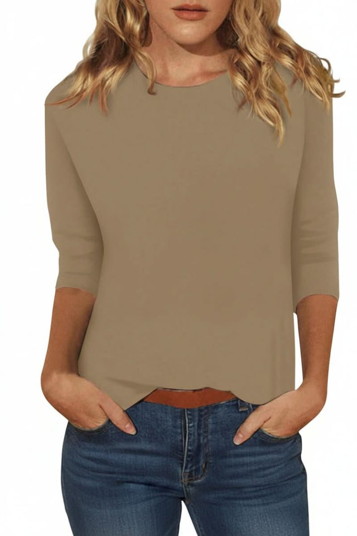 Stylish women's three-quarter sleeve top, a versatile blouse for effortless daily wear and sophisticated events.