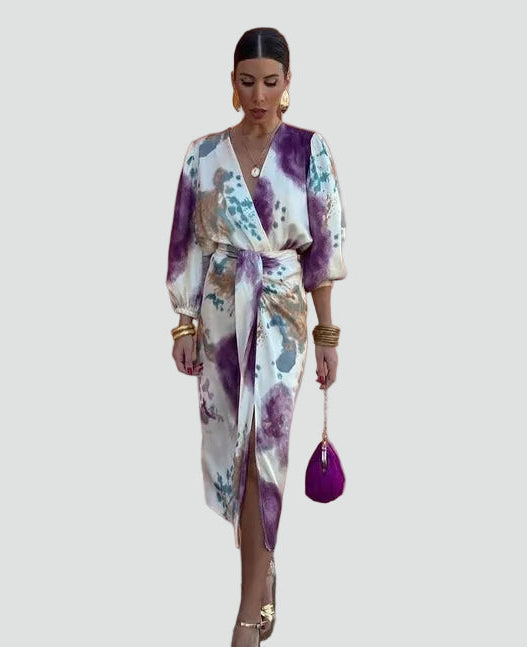 Flowy tie-dye wrap midi dress for women, featuring a flattering V-neck and adjustable waist. Great as a cocktail or party dress.