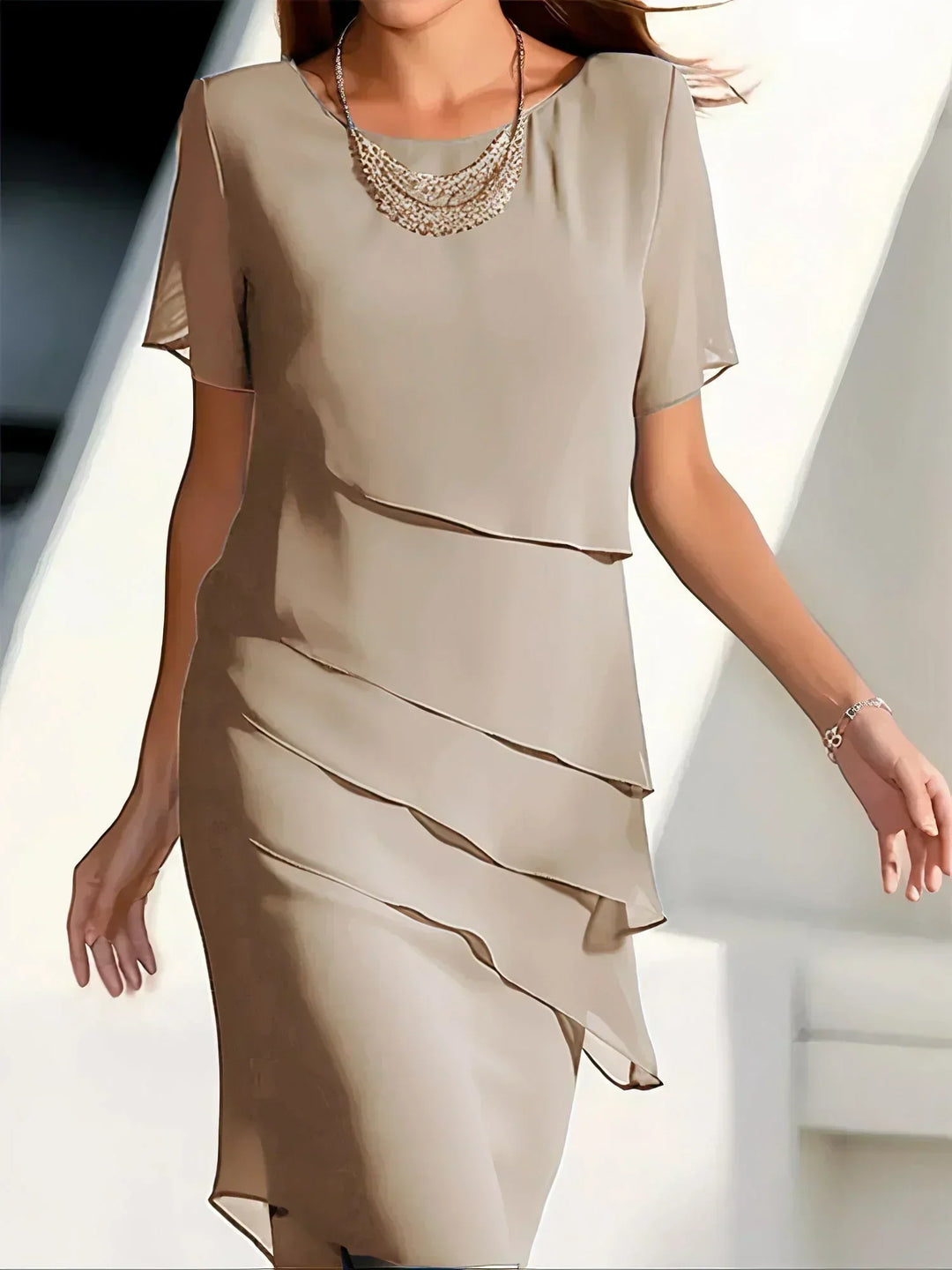 Sophisticated women's tiered midi dress, perfect for formal or semi-formal events. Elegant party wear.