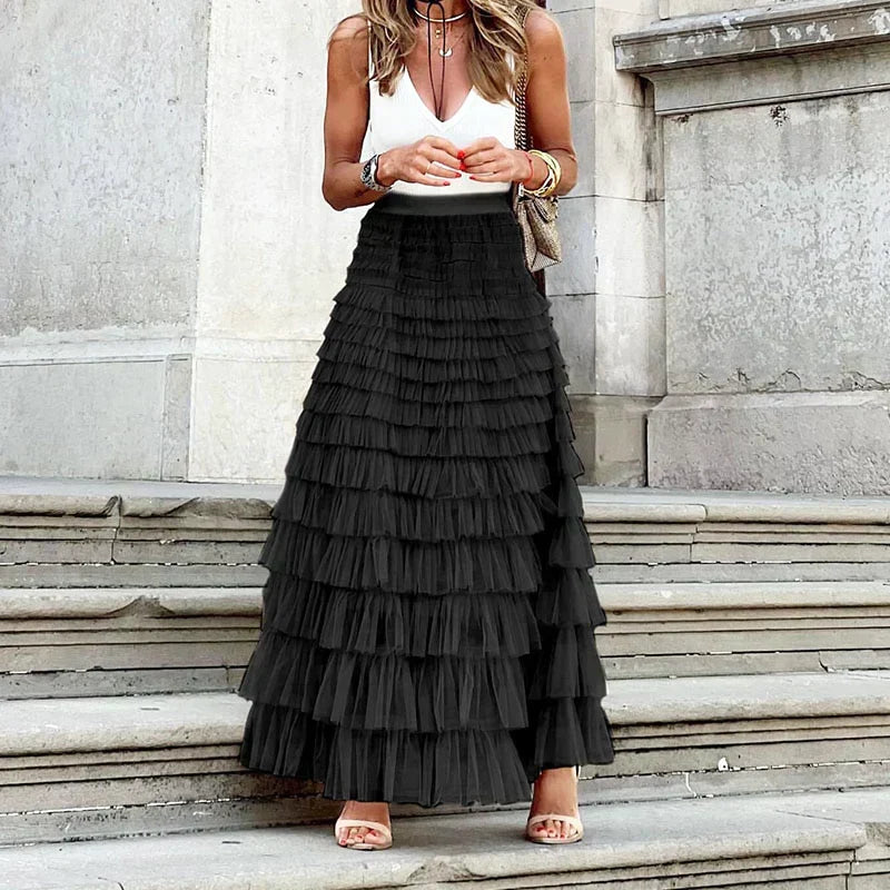 Stunning tiered ruffled maxi skirt for women, a perfect wedding guest outfit or elegant evening party skirt.