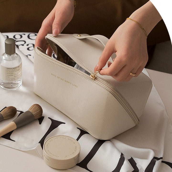Chic brown travel cosmetic case for women, a portable beauty storage and makeup organizer.
