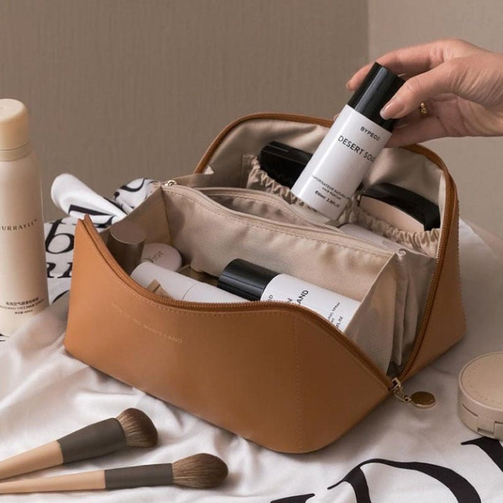Women's elegant travel makeup organizer, a practical and stylish accessory for cosmetic storage.