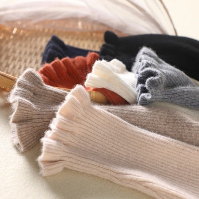 Luxurious women's cozy turtleneck sweater. Soft, warm long-sleeve jumper for elegant everyday comfort.