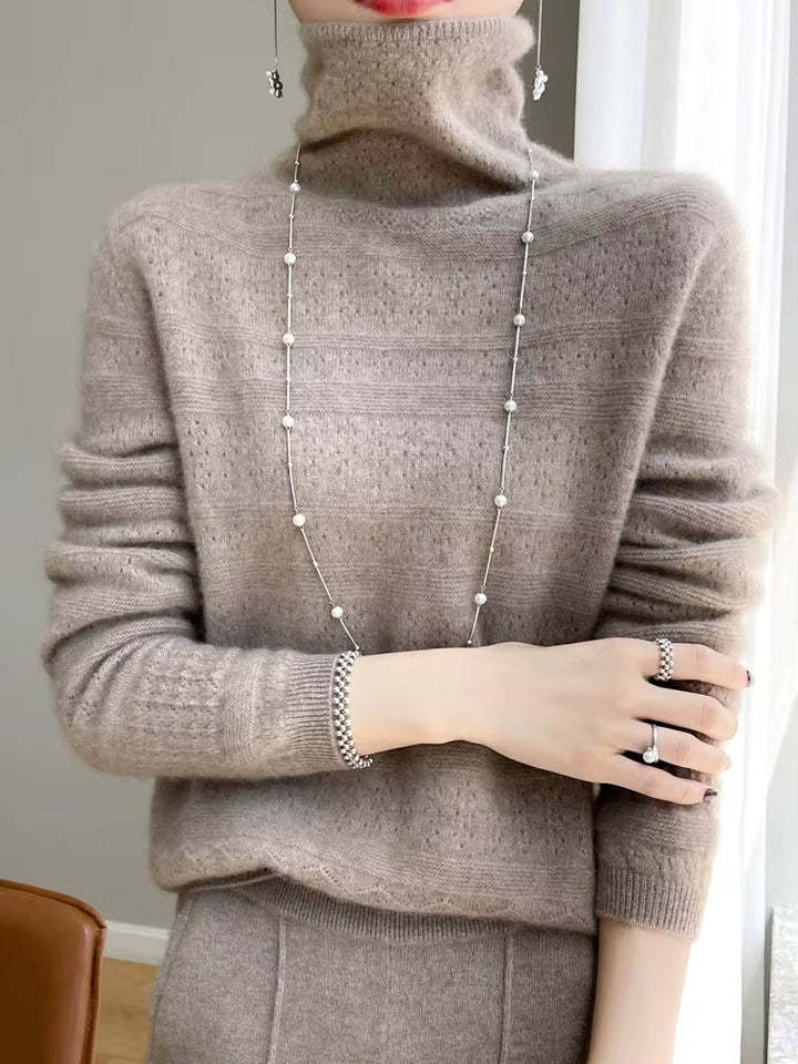 Chic black women's turtleneck pullover sweater. Soft knit, elegant design, ideal for stylish fall & winter comfort.