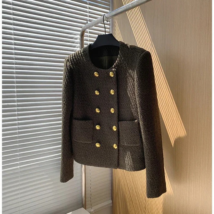 Women's stylish tweed blazer jacket, elegant and textured. A chic tailored piece for office or elevated casual wear.