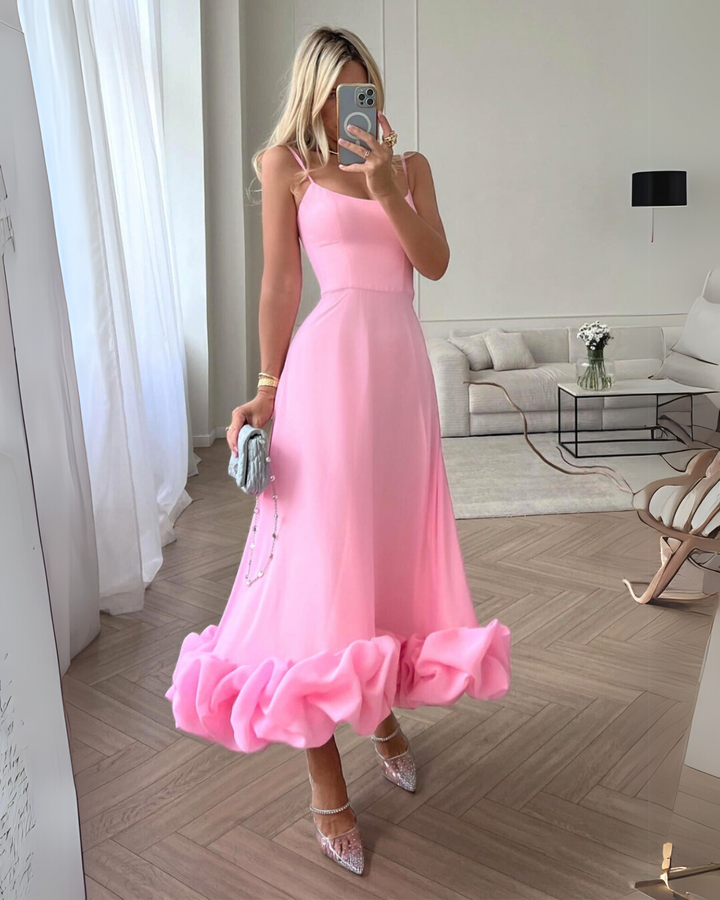 Elegant women's twirl dress, flowing fabric, perfect for a chic party or wedding guest outfit.