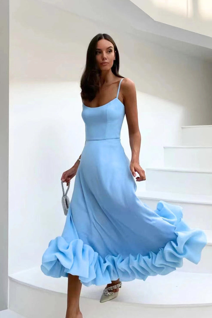 Chic women's elegant twirl dress, flowing design. Perfect party or wedding guest attire.