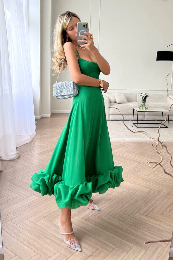 Chic women's twirl dress, elegant flowing style, ideal for dancing at a party or wedding.