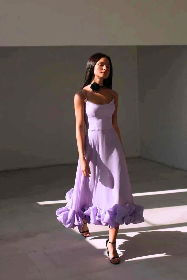 Feminine fashion women's twirl dress, chic and elegant flowing style for special events.