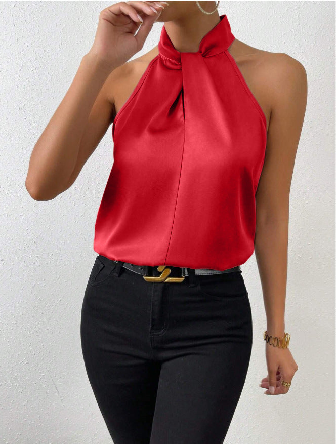 Vibrant colorful top, elegant twist knot neck, ideal for fashion-forward women.