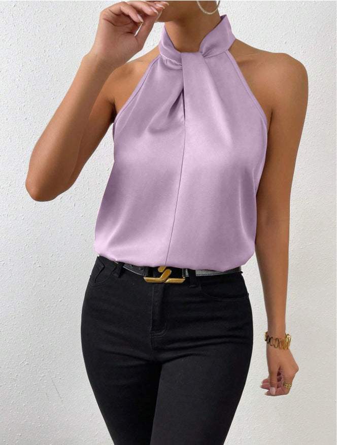 Sophisticated long sleeve women's top with a chic twist knot accent.