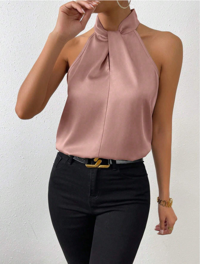 Sophisticated women's top featuring an elegant twist knot detail.