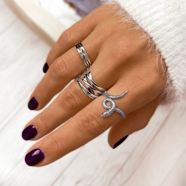 Fashionable gold-plated sterling silver women's ring, elegant twisted branch design, perfect for any occasion.