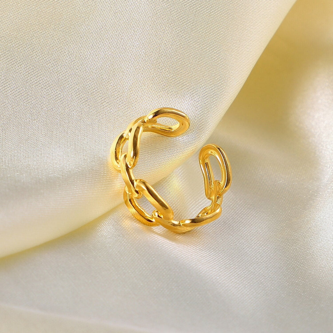 Adjustable gold plated twisted link open ring for women, a stylish and elegant accessory.