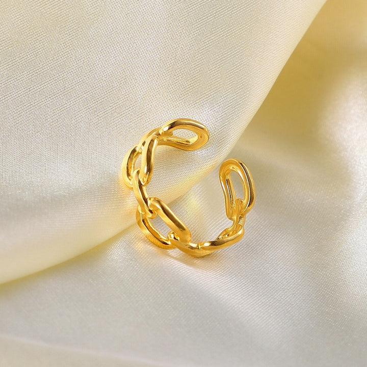 Adjustable gold plated twisted link open ring for women, a stylish and elegant accessory.