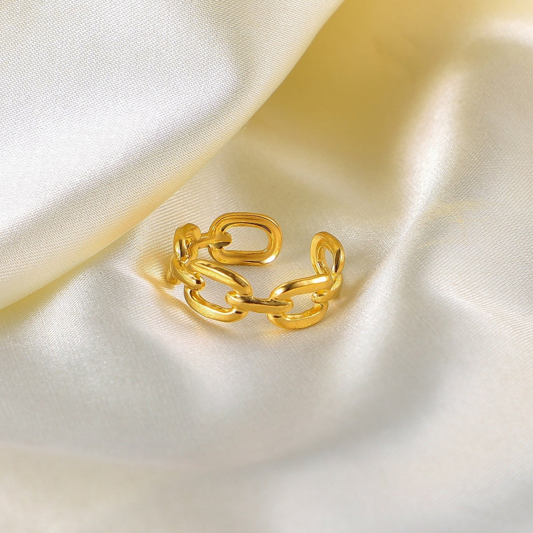 Stylish silver open link ring for women featuring a unique twisted design.