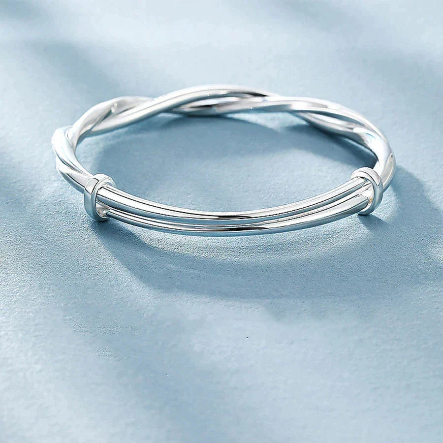 Luxurious women's twisted silver bracelet, exquisite sterling silver jewelry, a timeless fashion accessory.