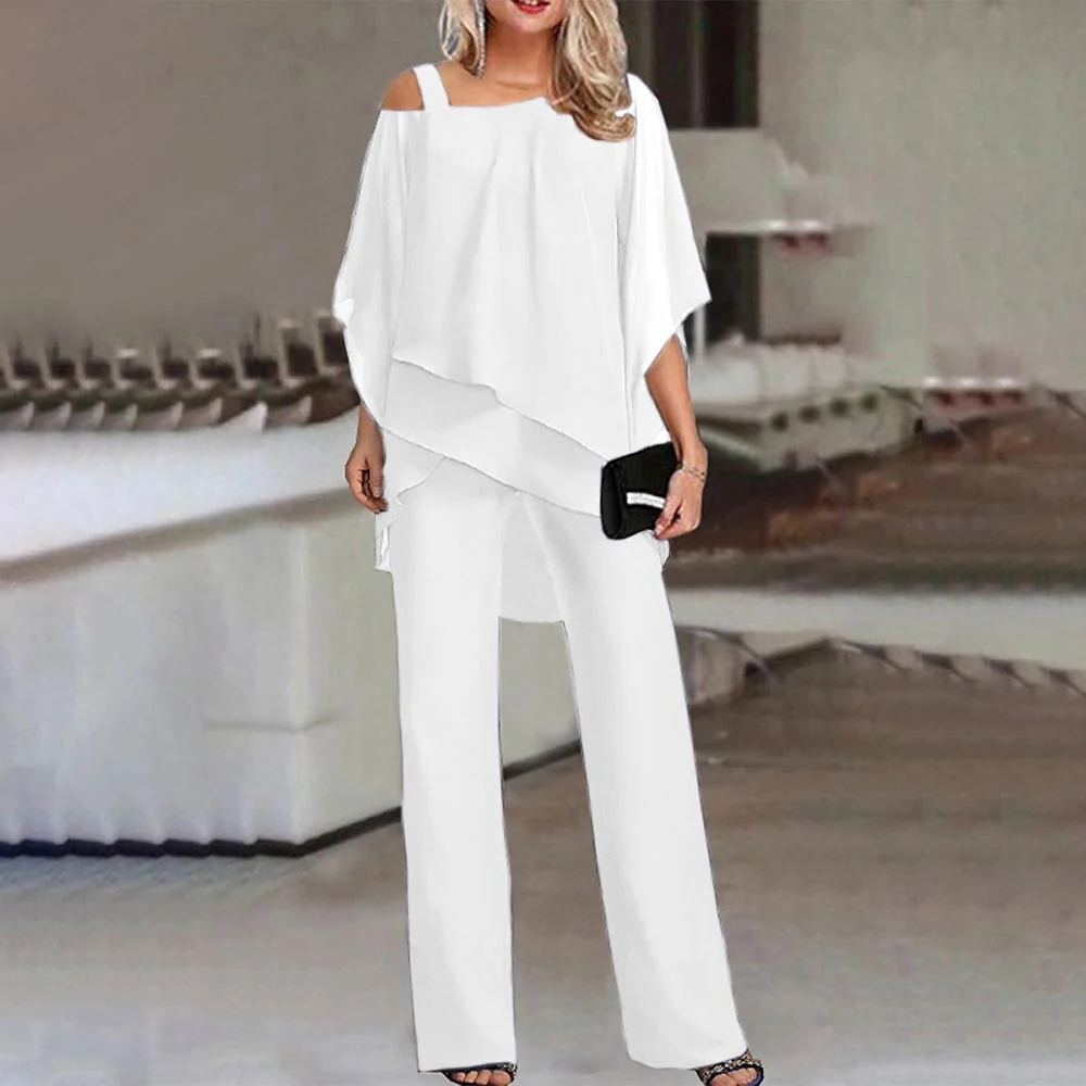 Elegant women's two-piece cold shoulder top and long pants set, perfect for formal events or party wear.