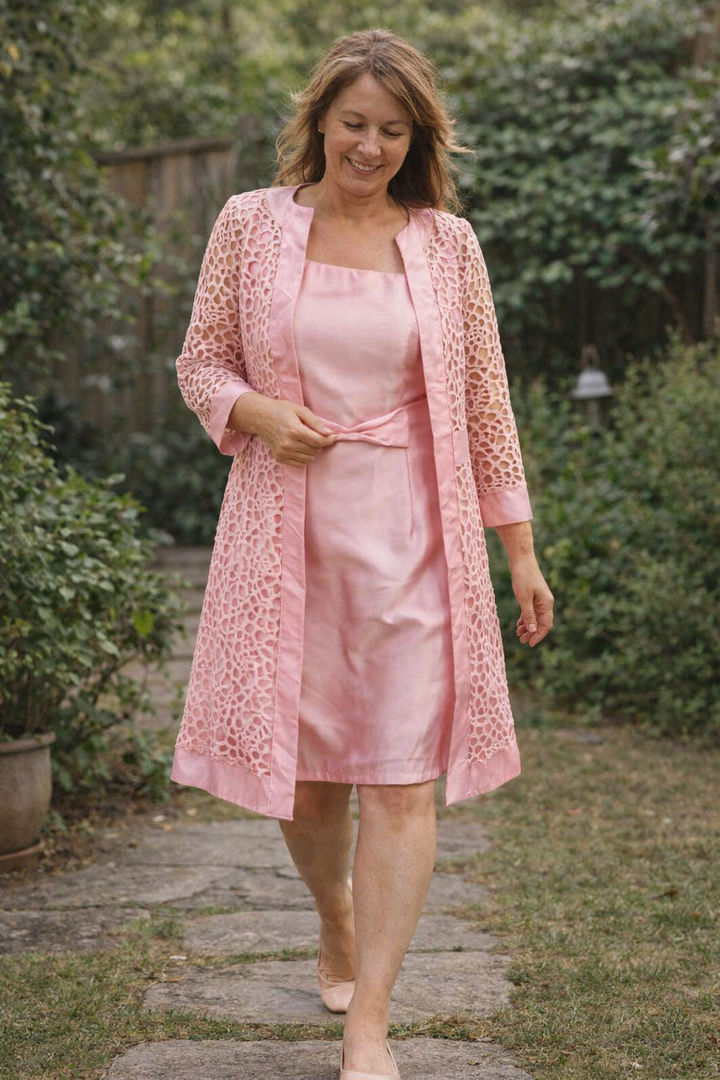 Elegant women's two-piece dress set with matching jacket, perfect for formal occasions & evening wear.
