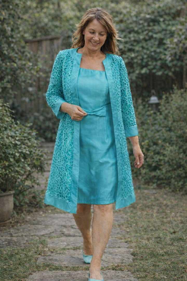 Modern women's elegant jacket and dress combo, a fashionable two-piece for formal & special events.