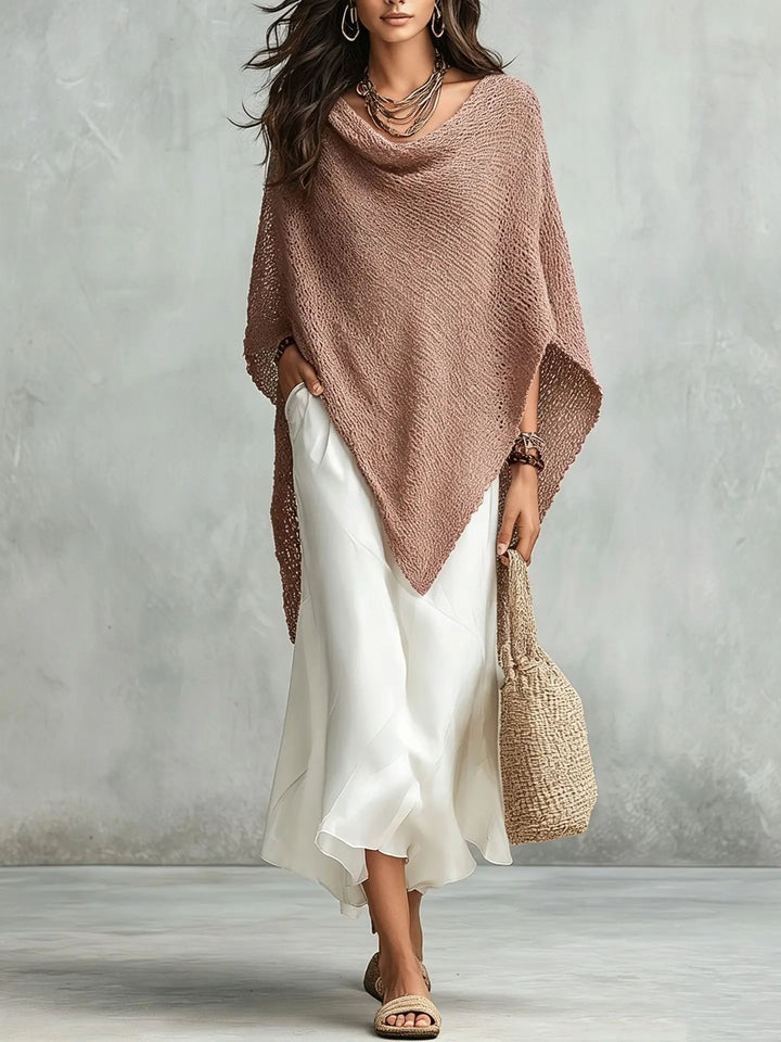 Relaxed fit women's two-piece ensemble featuring an elegant batwing poncho and a sleeveless maxi dress.