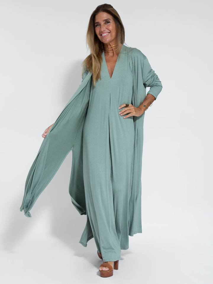 Elegant women's two-piece slimming dress and tailored vest set, perfect for versatile wear and a flattering silhouette.