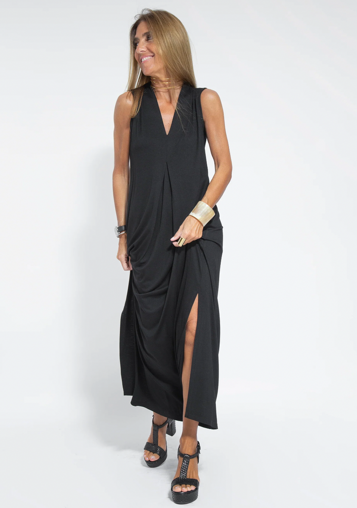 Stylish women's two-piece dress and tailored vest. A versatile, elegant outfit for formal or casual occasions.