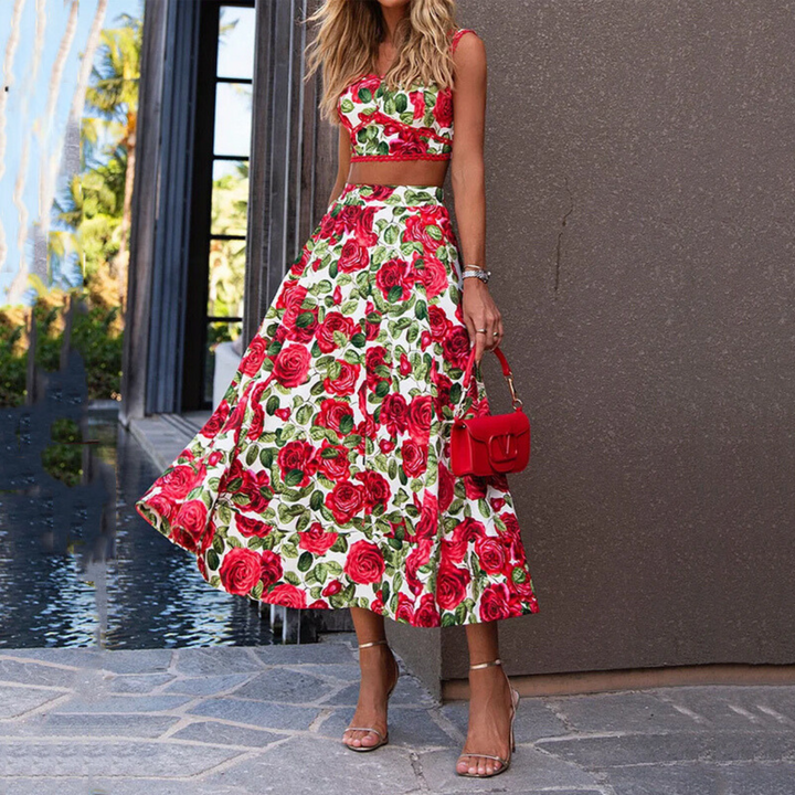 Elegant women's two-piece Solenne summer set with open-waist printed crop top and matching skirt.