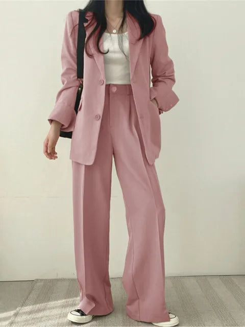 Professional women's suit with jacket and trousers. Sophisticated business casual outfit for daily wear.