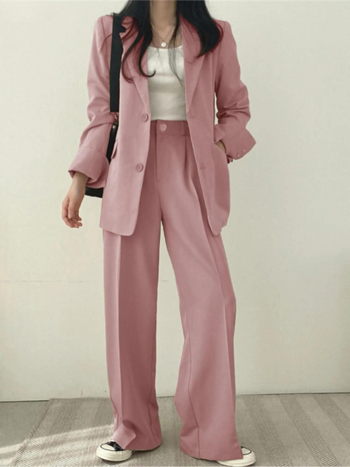 Elegant women's jacket & trousers set. Comfortable business suit for professional office and events.