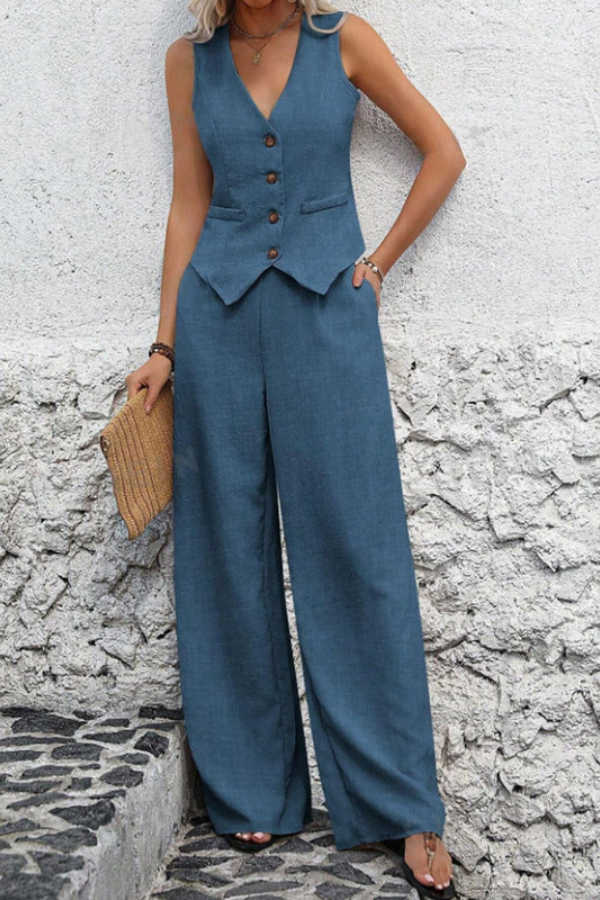 Modern women's tailored vest and flowing wide-leg trousers. A sophisticated two-piece set for professional attire.