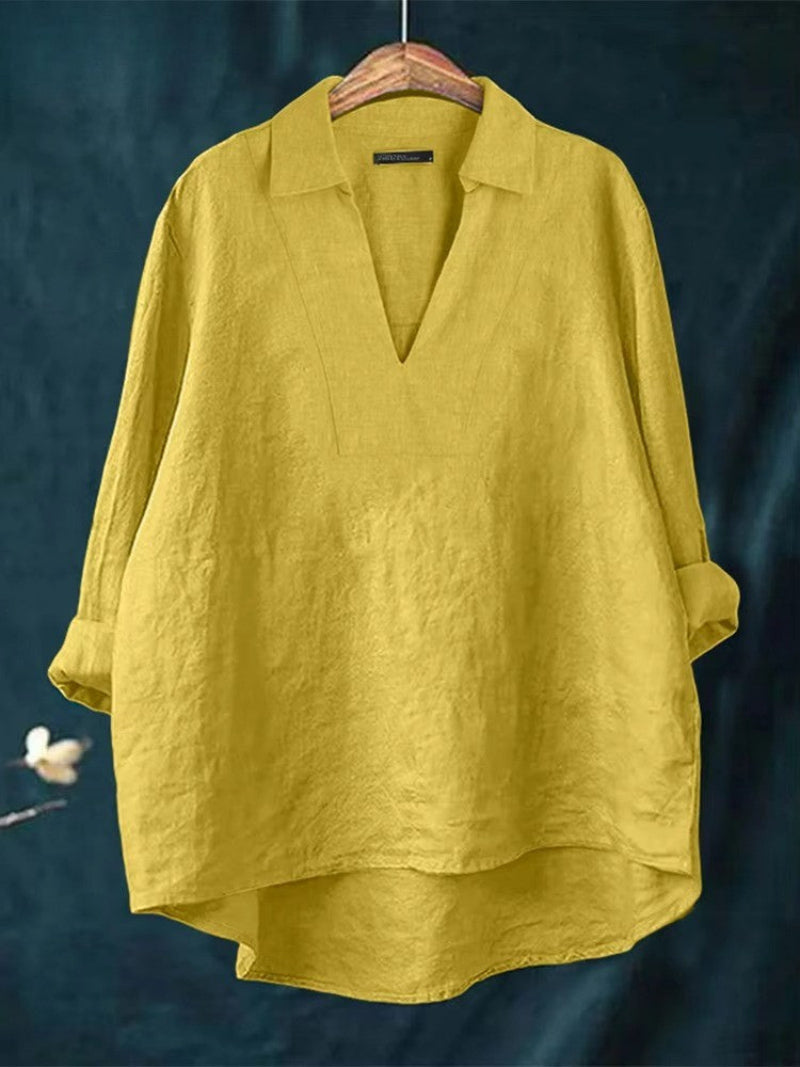 Chic women's V-neck blouse in a relaxed fit, offering versatile and comfortable style for any event.