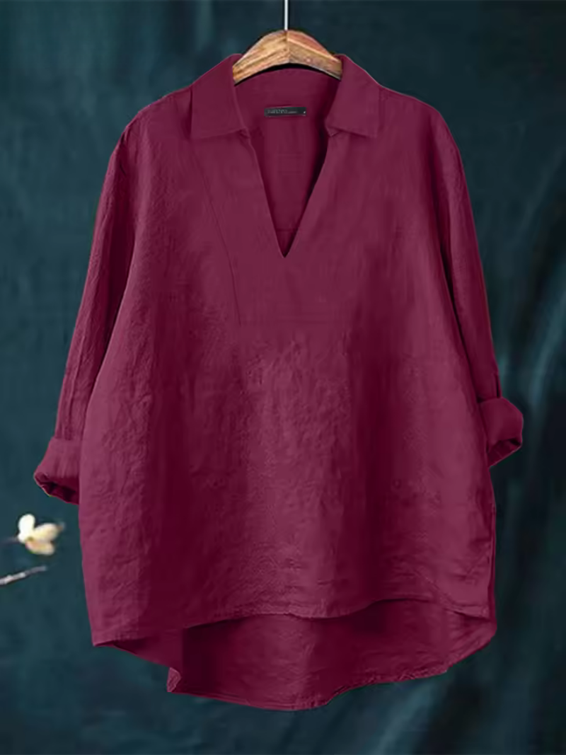 Sophisticated women's V-neck blouse with effortless style. A comfortable and elegant top for fashion.