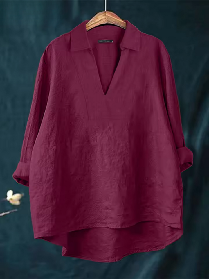 Sophisticated women's V-neck blouse with effortless style. A comfortable and elegant top for fashion.