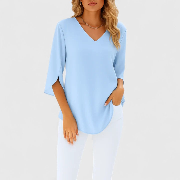 Elegant women's V-neck blouse, sophisticated & chic for versatile summer fashion. Comfortable fit.
