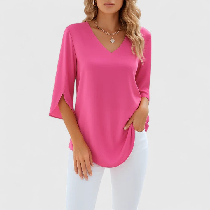 Versatile women's V-neck blouse, ideal for casual elegance or sophisticated summer wear.